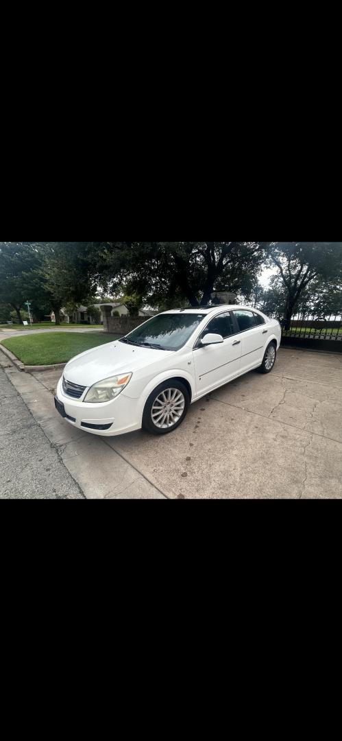 2007 White /Black Saturn Aura XR (1G8ZV57757F) with an 3.6L V6 24V DOHC engine, 4-Speed Automatic Overdrive transmission, located at 2425 Franklin Ave., Waco, TX, 76701, (254) 753-6661, 31.540359, -97.148682 - Photo#2